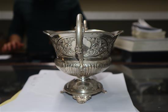 A late Victorian embossed silver two-handled shaped oval bowl, London, 1900, 18.5 oz.